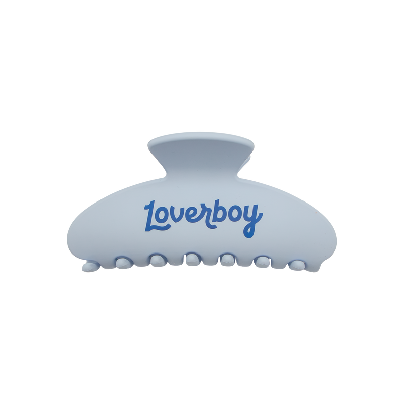 Light blue claw hair clip with dark blue Loverboy lettering.