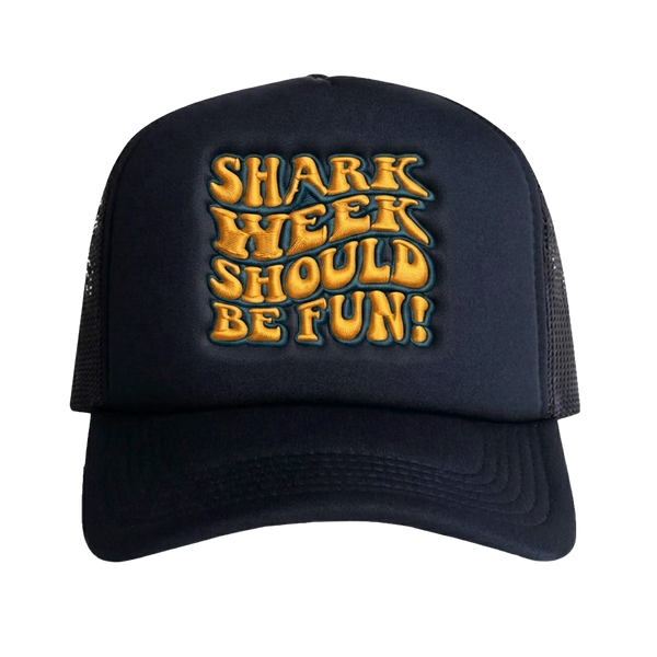 A black trucker hat with 'SHARK WEEK SHOULD BE FUN!' embroidered in yellow and gold bubble letters with a dark blue outline on the front panel, shown against a plain white background.